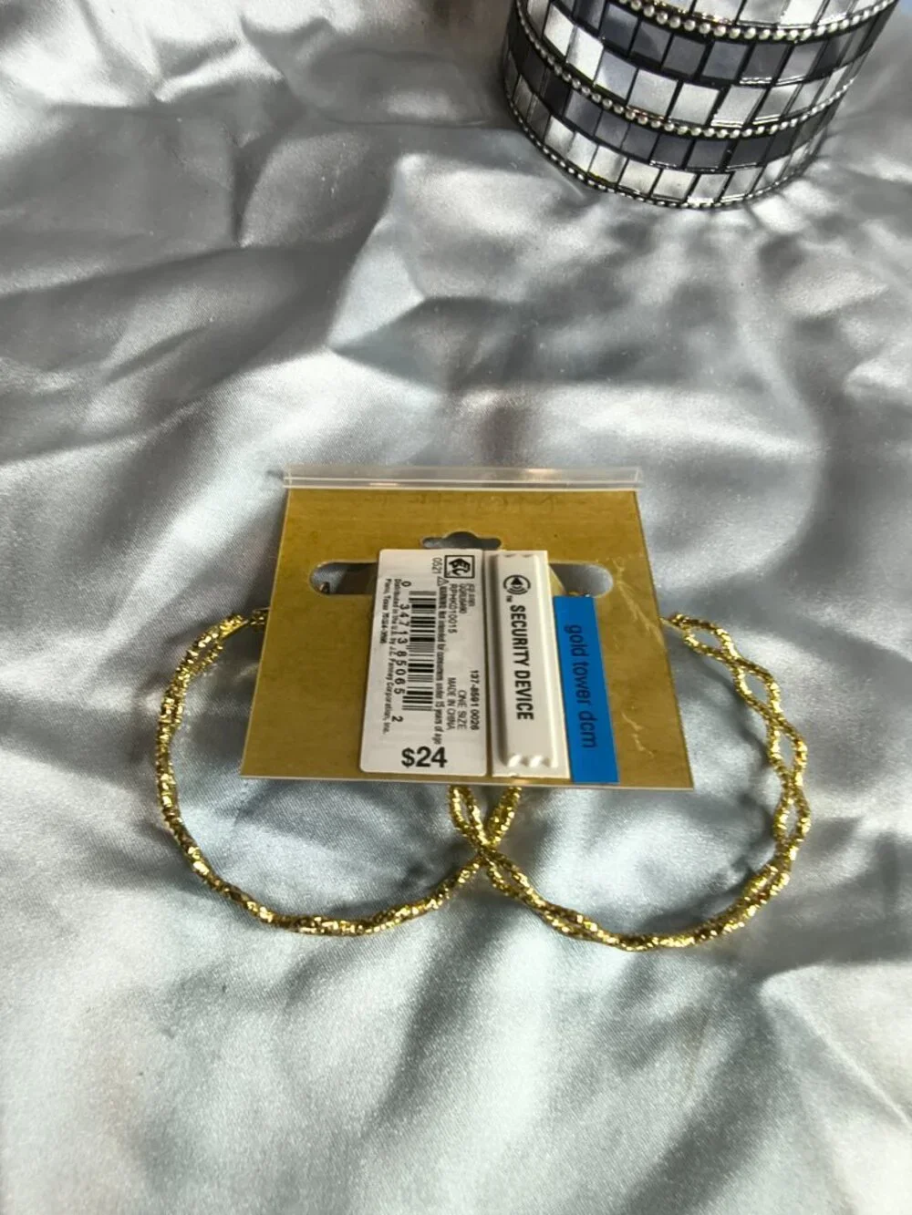 Monet Gold Tone Criss Cross Hoop earrings